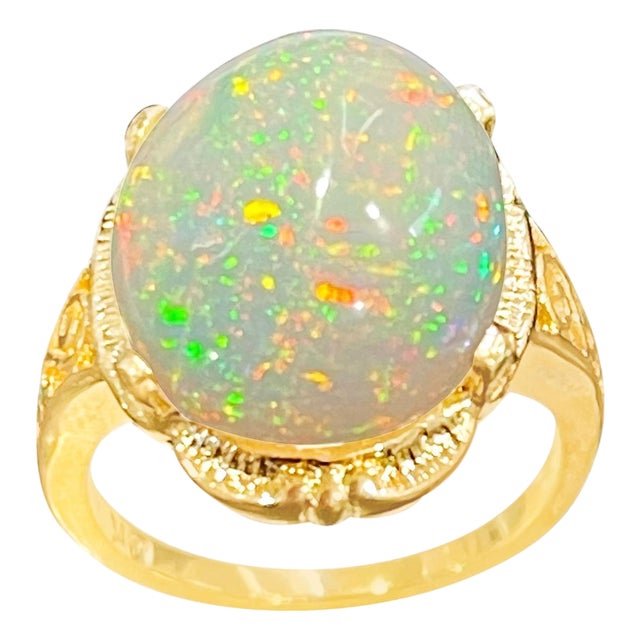 9 Carat Oval Shape Ethiopian Opal Cocktail Ring 14 Karat Yellow Gold For Sale