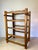 Substantial vintage wine rack in solid teak by Winsome Wood, featuring a tall, open ladder-style frame with five...