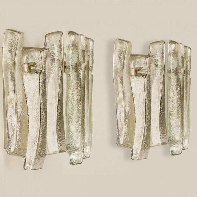 Beautiful and elegant modern wall lights in the style of kalmar in the 1970s. A lovely design. Twelve thick, textured...