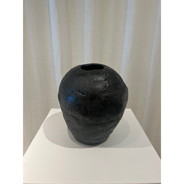 Dimensions: 8.5: diameter x 10” h Material: stoneware Finishing: unglazed Color: black Edition: one-of-a-kind