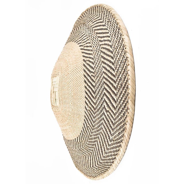 Tonga Binga baskets are traditional handcrafted baskets made by the Tonga women of Binga district in Zimbabwe. Crafted...