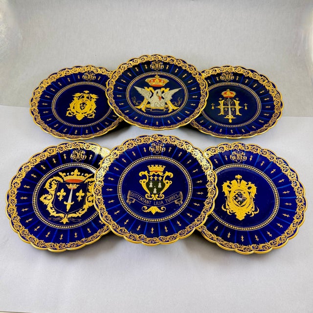An important set of six heraldic crest plates by the French artist Gustave Asch (1856-1911), for Old Sainte – Radegonde...