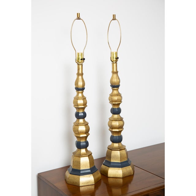 Mid-century cast metal buffet lamps. Hollywood regency bold style with stacked geometric shapes. Listing is for a pair....