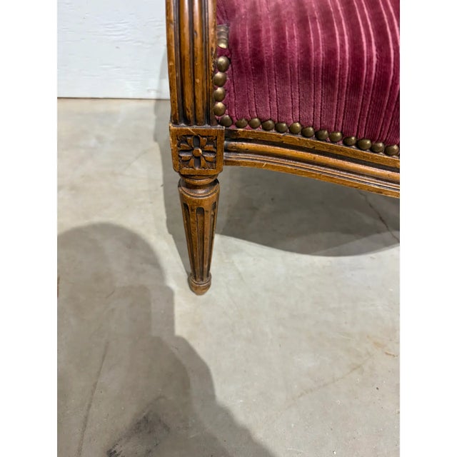 Ruby Red 1920s French Louis XVI Vintage Solid Walnut Carved Armchair or Bergere - A Pair For Sale - Image 8 of 11