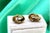 Yellow gold cufflinks with intertwined link-shaped windings. Metal: Gold. Origin: Portuguese. Brand: Tigre II Title....