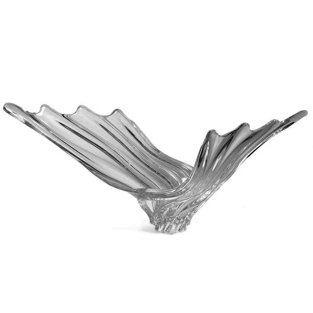 Exceptional and important lead-crystal centerpiece in clear, transparent crystal. Its elongated and daring...