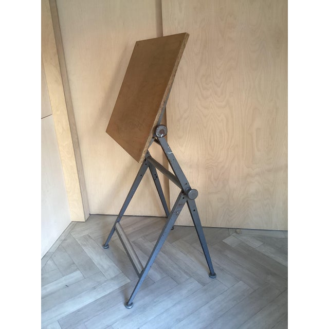 The iconic Reply drafting table is a masterpiece of Dutch industrial design from 1958, designed by Friso Kramer and Wim...