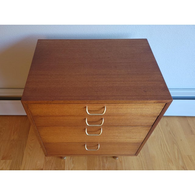 Charming Mahogany Four Drawer Chest by Harvey Probber. The chest has four varied sized drawers with ample storage and the...
