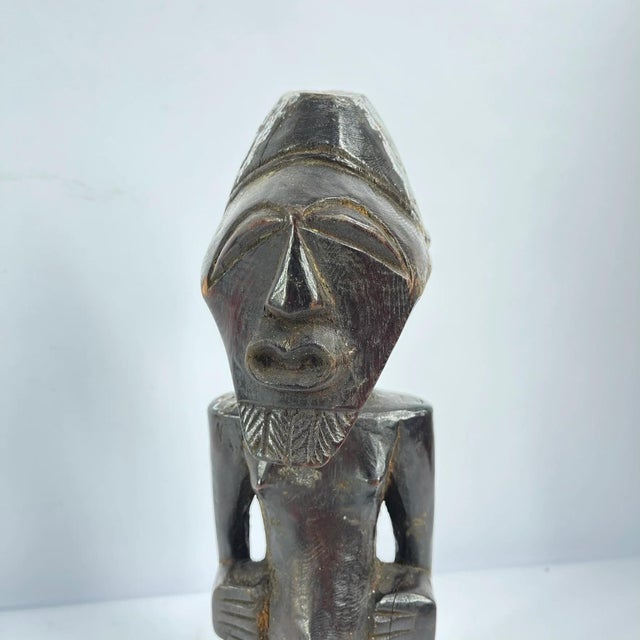 The Songye Nkishi power fetish figure originates from the Lualaba River in the savanna territory. Figures like this are...