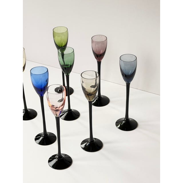 Set of 8 MCM ebony, long stemmed, multi colored cordial glasses; circa 1960s'1970s. Highly collectible and frequently...