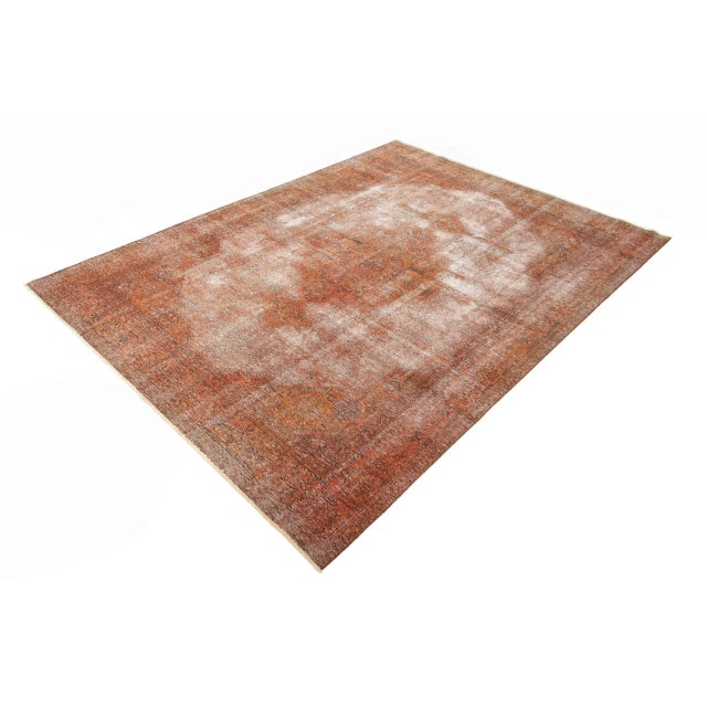 This exceptional hand-knotted designer rug from Pakistan combines traditional rug craftsmanship with a modern and...
