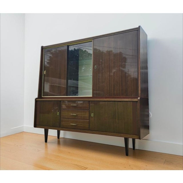 Stunning, authentic Mid-Century Modern German Schrank (wall unit / hutch / bar cabinet) manufactured in West Germany...