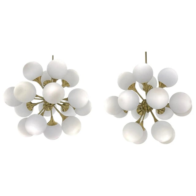 Phenomenal vintage Murano glass and brass sputnik cloud chandeliers. These are exceptional quality and they create a huge...