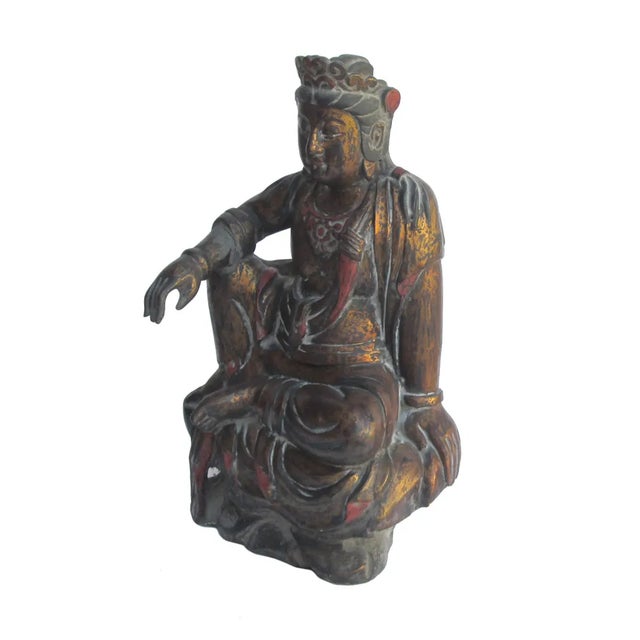 This is a decorative Kwan Yin statue in vintage style finish. The surface is a layer of black lacquer and touched up with...