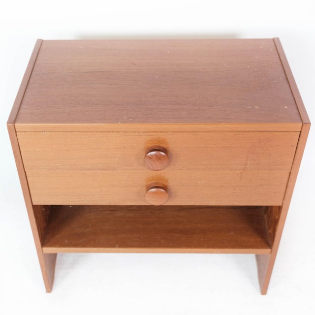 Bedside table with drawers in teak of Danish design manufactured by PBJ Furniture in the 1960s. The table is in great...