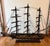 This stately Frigate model was crafted in Spain, circa 1950. Named "Frigata Espanola," the large naval sailboat sits on an...