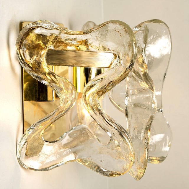 A fantastic and kalmar wall light model "catena" by j.t. Kalmar, austria, manufactured in the 1970s. These lights are...