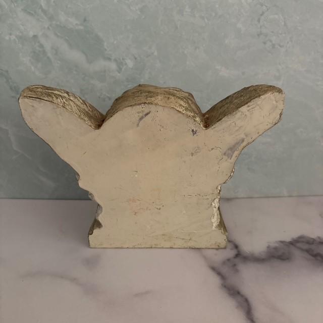 Vintage 1980s angel or cherub bookend. Made of cast stone. Use for books or as Gothic decor. Heavy and substantial.