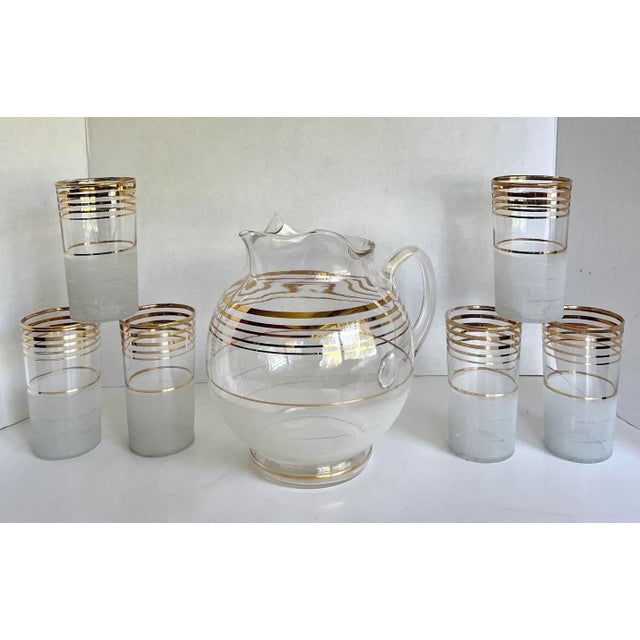 Here is a gorgeous set of SEVEN pieces - 6 glasses with matching pitcher. The set is in really great condition. Each piece...