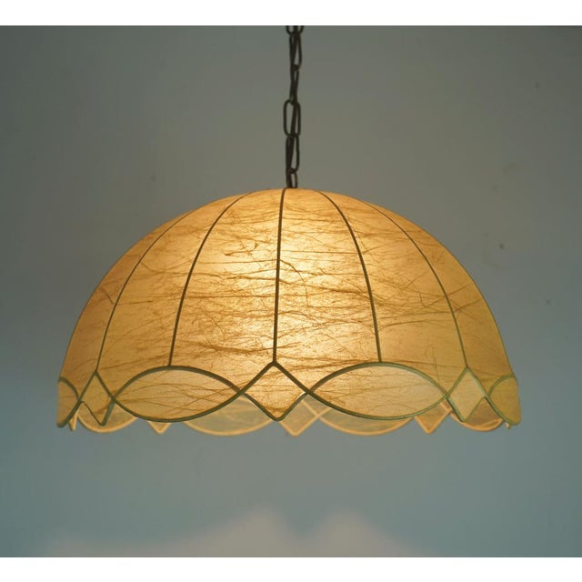 A beautiful pendant lamp from the 1970s. Unmarked, but likely manufactured by Goldkant-Leuchten Friedel Wauer. It features...