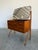 Petite Danish Teak Dressing Table Vanity. Beautiful sculptural legs, 5 drawers and black glass reverse painted top....