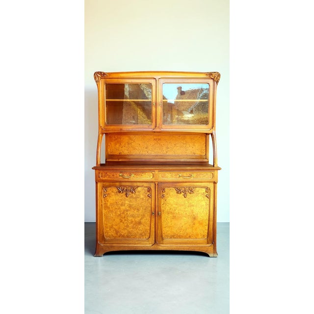 Two-part buffet, Art Nouveau style / Nancy School, unsigned, circa 1900 Wood: solid walnut, burr wood panels Upper...