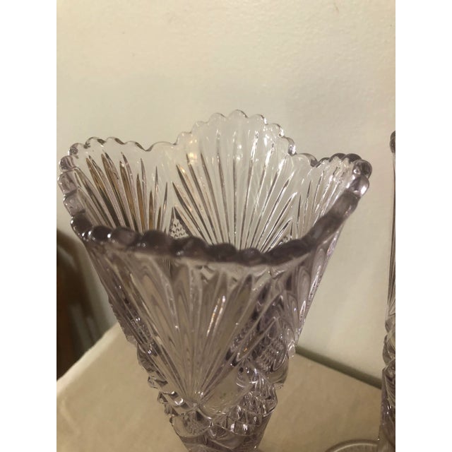 The most striking feature of these turn of the century trumpet vases is the “ sun purple “ coloring. They are no longer...