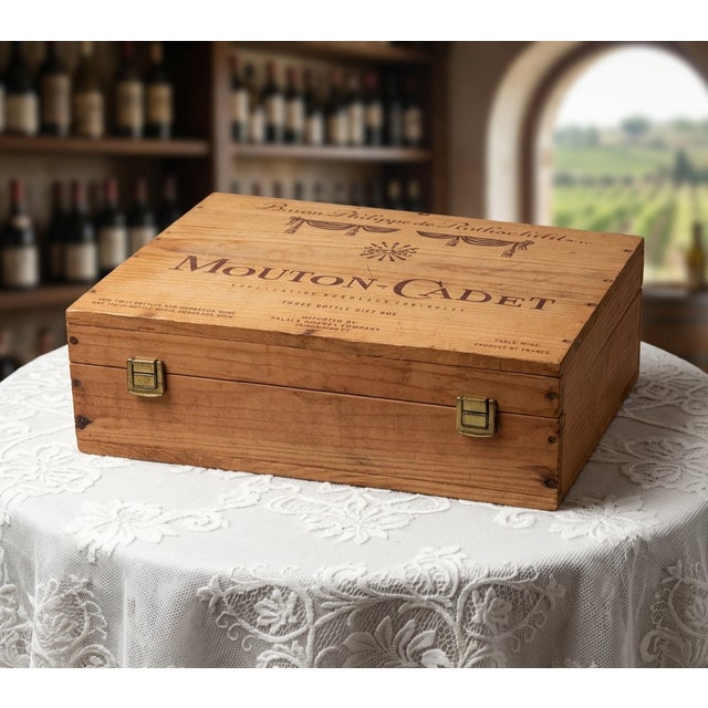 A classic piece of Bordeaux heritage from the legendary Baron Philippe de Rothschild estate. This vintage wooden...