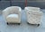 Stunning pair of lounge chairs designed and manufactured by Luxury Living. The chairs feature beautiful tufted backs and a...