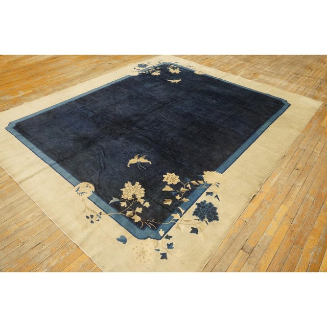 Antique Peking Chinese Allover Floral Beige 1920s Square Rug, Circa Date: 1920s. This exceptional square piece exemplifies...