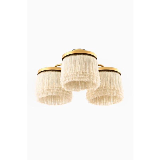 The ceiling lamp model t-606/3, designed by hans-agne jakobsson and produced by his namesake company in markaryd, sweden...