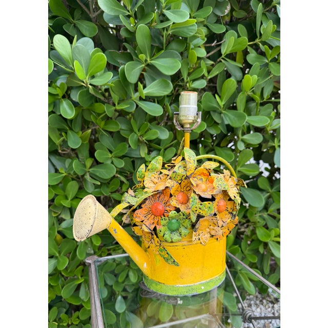 Vintage sculptural table lamp fashioned from a painted metal watering can and extensively embellished with hand-formed...