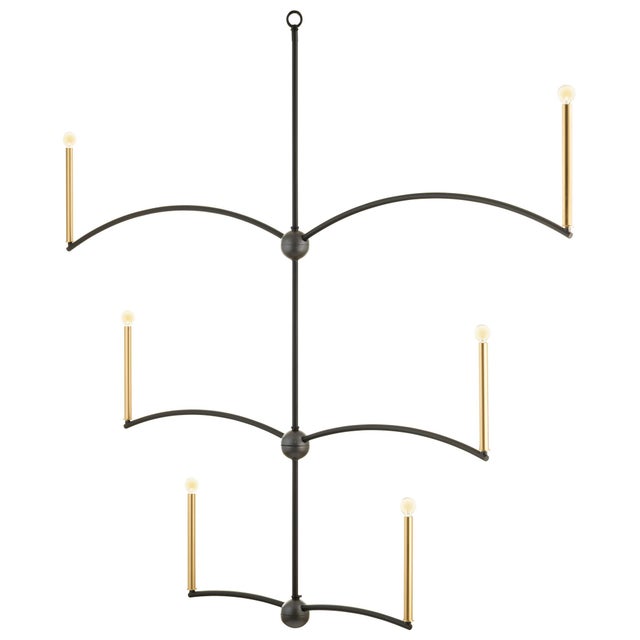 The Park Avenue Chandelier blends organic inspiration with architectural grace. Adjustable arcs and intersecting spheres...