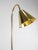 Fantastic foot lamp Design of the great French architect and designer Jacques Adnet made in brass by the prestigious...
