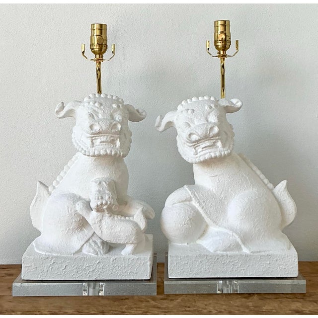 Guard your interiors with style and serenity using this striking pair of vintage white Foo Dog table lamps. A perfect...