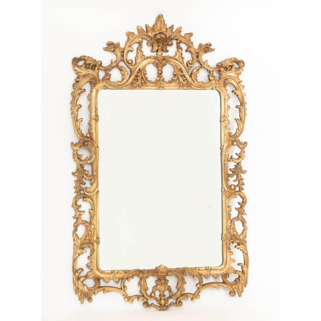 Rococo Style Silvered and Gilt Composition Framed Mirror, reticulated scrolling foliate design frame centering a...