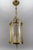 French brass and cut clear glass round hanging lantern from circa the 1920s. This adorable three-light antique pendant...