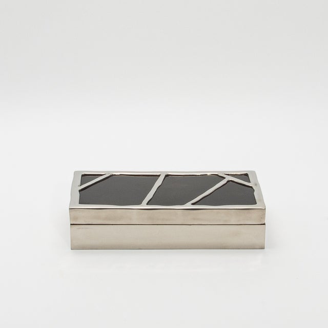 The “Melting Box” by R&Y Augousti is a stunning piece of functional art that merges luxurious craftsmanship with...