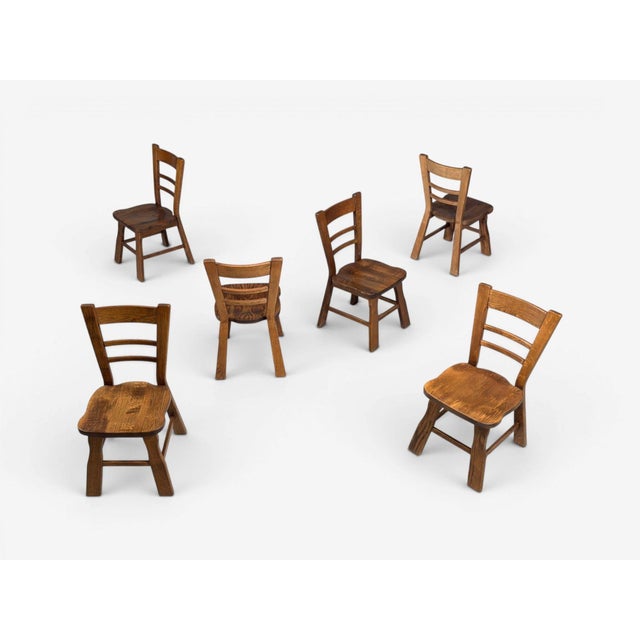 Belgian Mid-Century Modern, Six Brutalist Dining Chairs, Oak, Belgium, 1970s Set of six substantial brutalist solid oak...