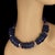 This is part of Chairish’s Fine Jewelry assortment. 17-Inch Lapis Lazuli and Sterling Silver Choker Necklace – Bold and...