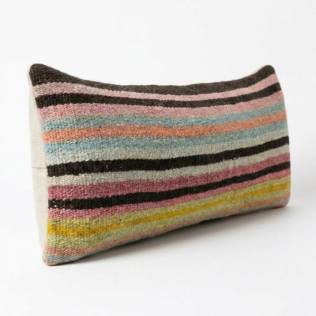 This beautiful 9'' x 22'' hand-woven Kilim pillow cover was made from an authentic Turkish kilim. The traditional flat-...
