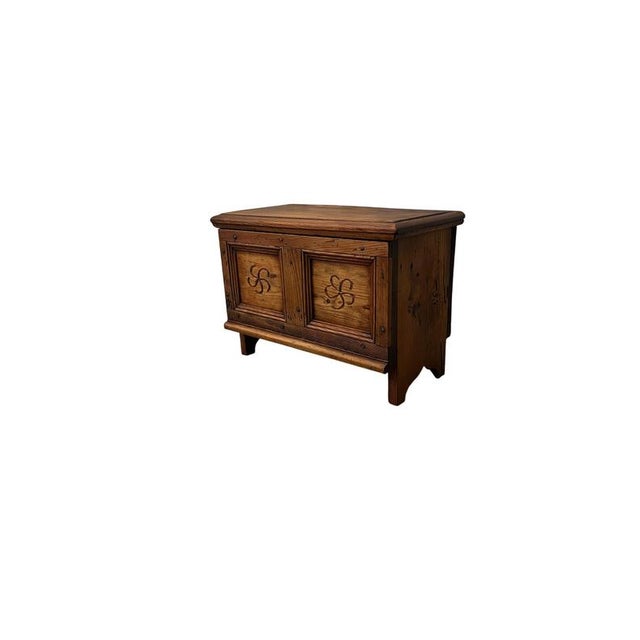 This charming chest dates back to the late 19th century, crafted from larch wood and featuring a simple, solid structure...