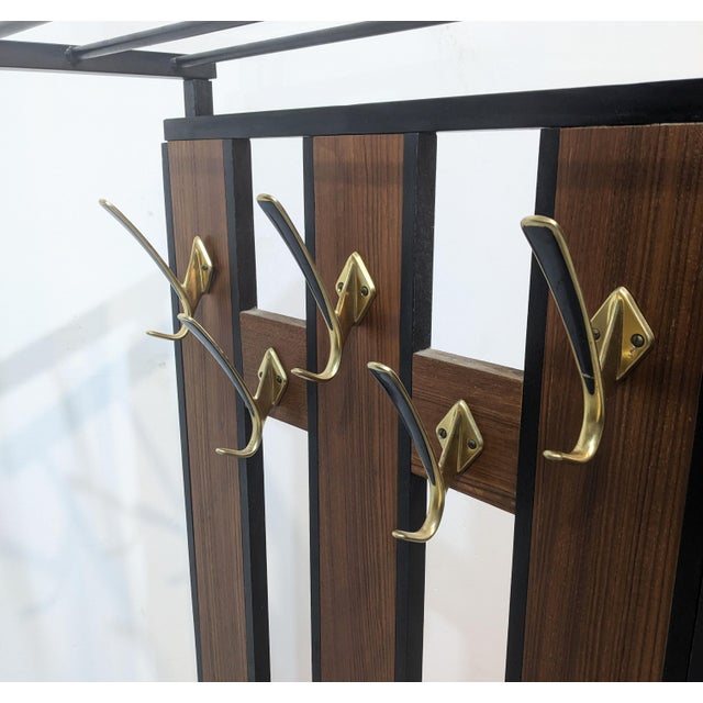 Mid-century coat rack with storage chest and mirror Vintage coat rack with five hooks, storage chest and mirror. Excellent...