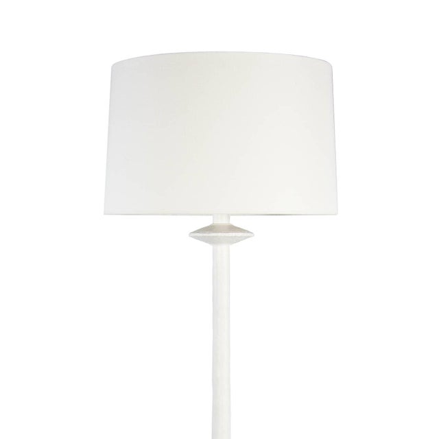 Inspired by a paper maché sculpture, the versatile Hope Floor Lamp is at home in a variety of spaces. Complex curves,...