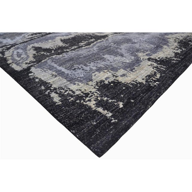 Beautiful hand knotted modern and fashionable collection of borderless designs rug, made of 75% wool and 25% cotton in...