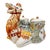 A monumental ceramic centerpiece capturing the playful sophistication of Mid-Century Hollywood Regency and Chinoiserie...