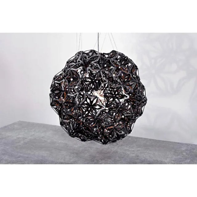 Unity globe light v.1 by paul heijnen (2016) dimensions: h85 x l85 x w85 cm materials: coated steel/stainless steel...