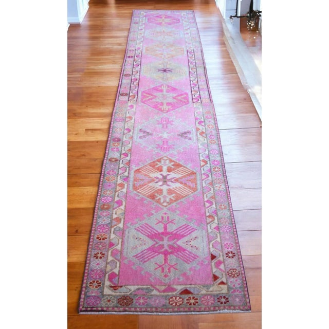 Offered is a bright Kurdish runner rug, made in Hakkari approximately 50-60 years ago. The beautiful wool on cotton pile...