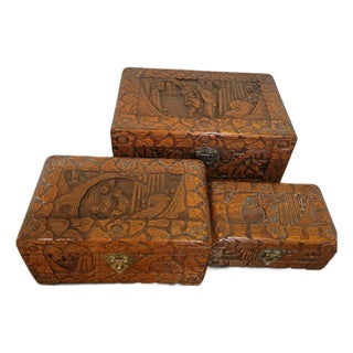 Mid-20th Century Chinese Carved Camphorwood Nested Boxes (Set of 3) by Hung Hop Chests Co. For Sale