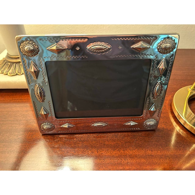 Can display portrait or landscape. Frame measures 9"x" 7" outside it's for a 5"x 7" picture. Very good condition. The...